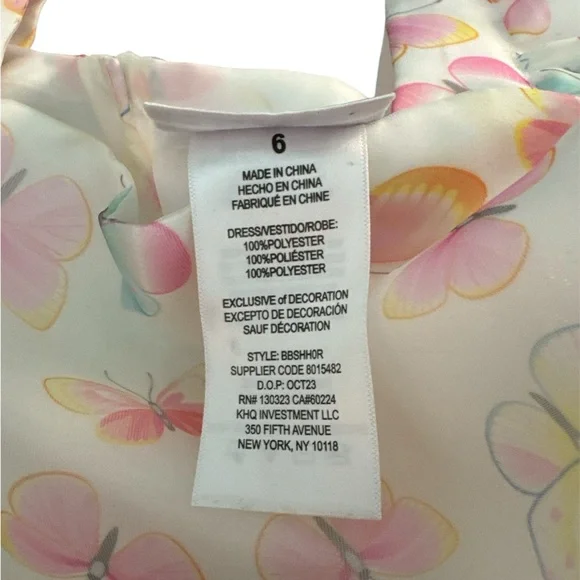 Beautiful ivory dress with a soft pastel butterfly print. - Picture 5 of 5